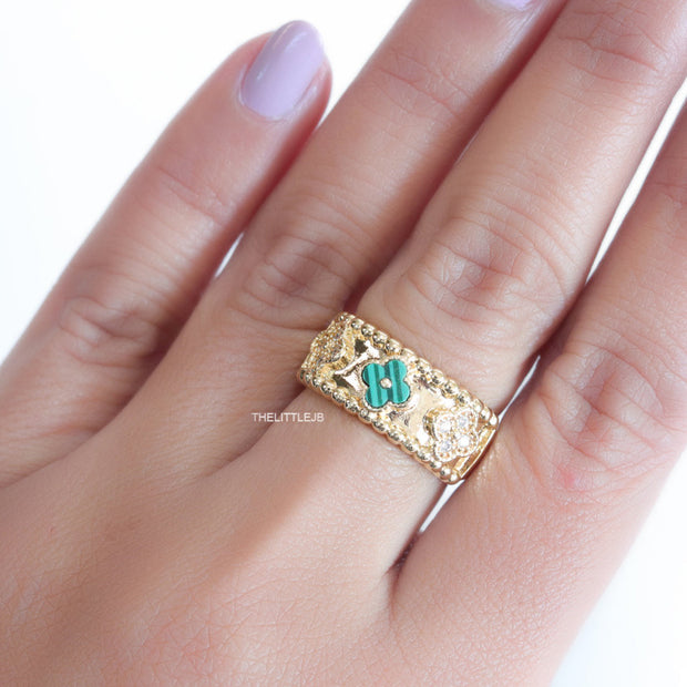Golden ring band with malachite green and cz clovers